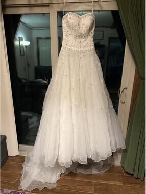 Beautiful Oleg Cassini strapless beaded wedding dress